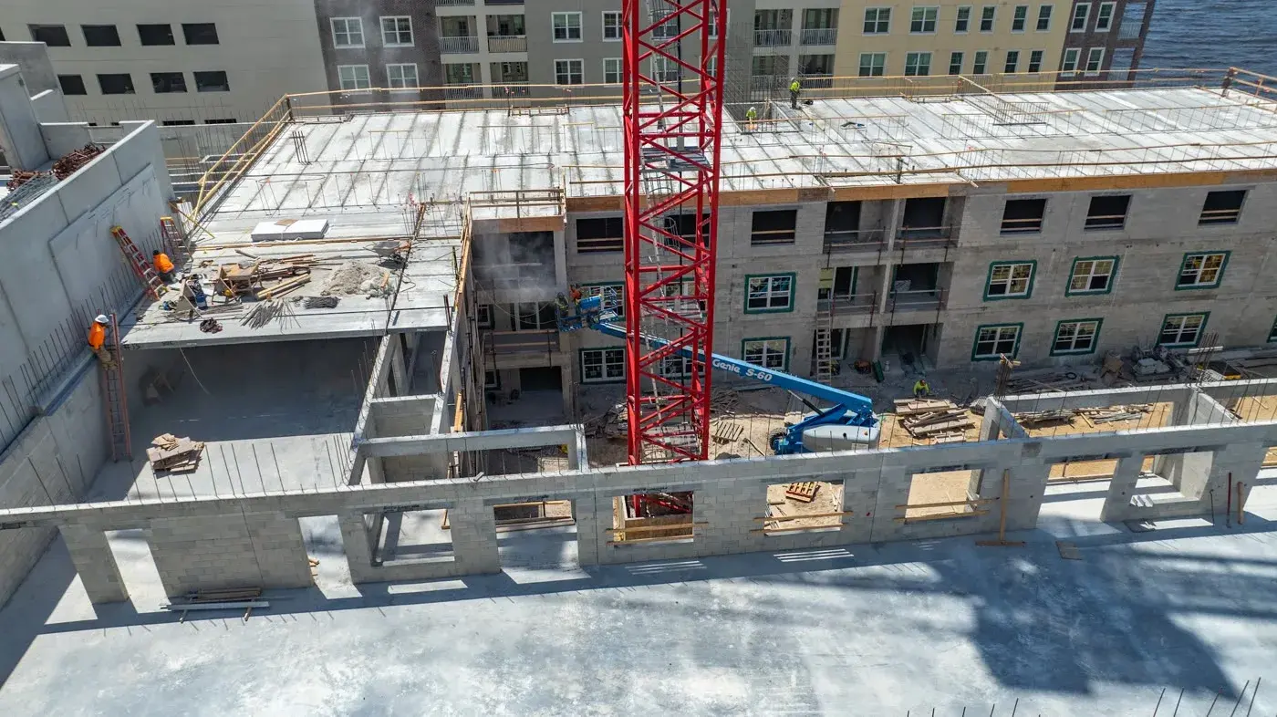 Aerial footage of a construction site being documented from above.